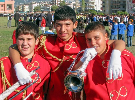 Post parade rest.  That trumpet on the left could use a shine.