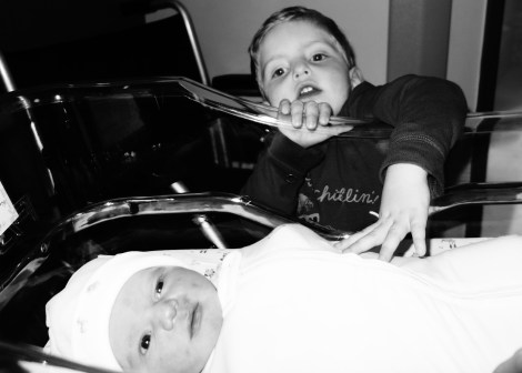 Alexander wants to play with his new sister.