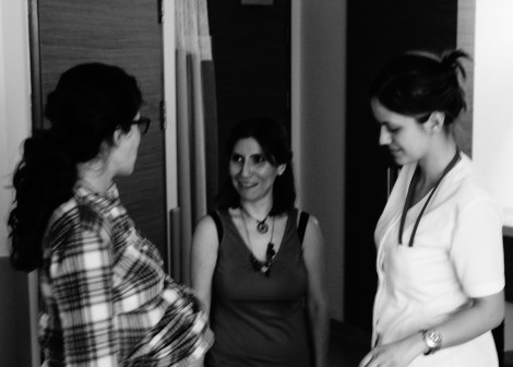 Sima chats with the doula and nurse midwife upon arrival at the hospital.