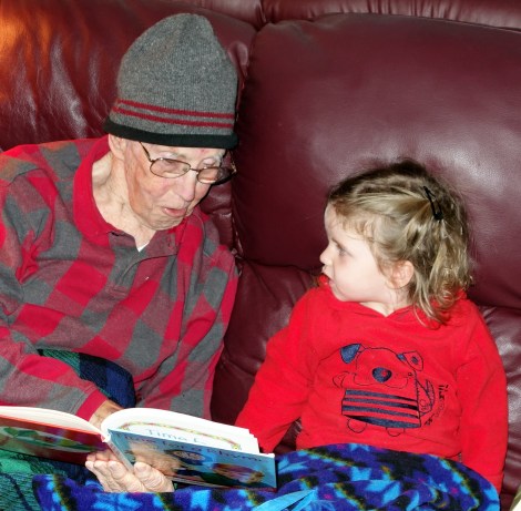 Gramps reads to Aylin.